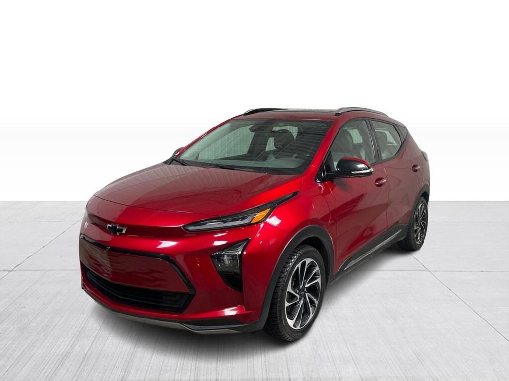Red Chevrolet Bolt EUV parked in a studio setting with a white background. The image features the logo of "AutomobileEnDirect.com" at the top right corner and a red banner at the bottom with a phone icon and text in French: "Appelez-nous : 1 888-692-0958".